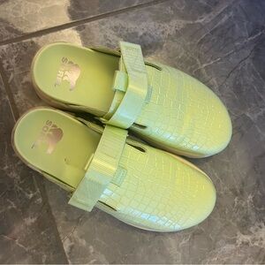 Sorel Light Green Croc-Patterned Slip-Ons